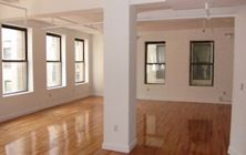 Open Plan Commercial Loft Space for Lease at 67 Spring Street, in the heart of SoHo, Manhattan.