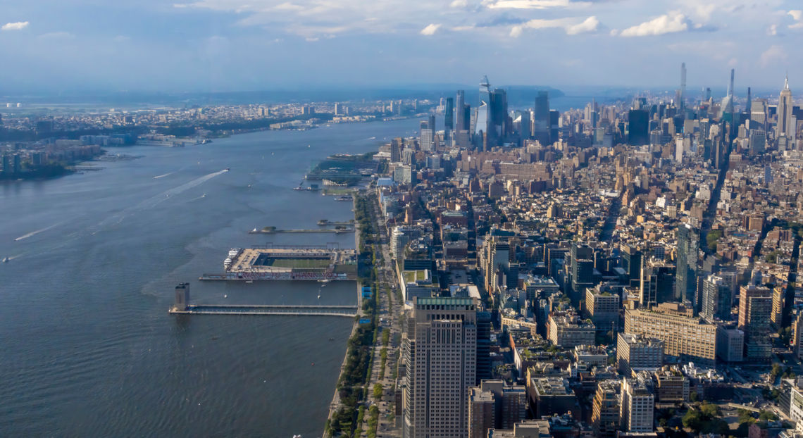 NYC skyline and Hudson River view from One World Observatory, featuring 330 Hudson Street.