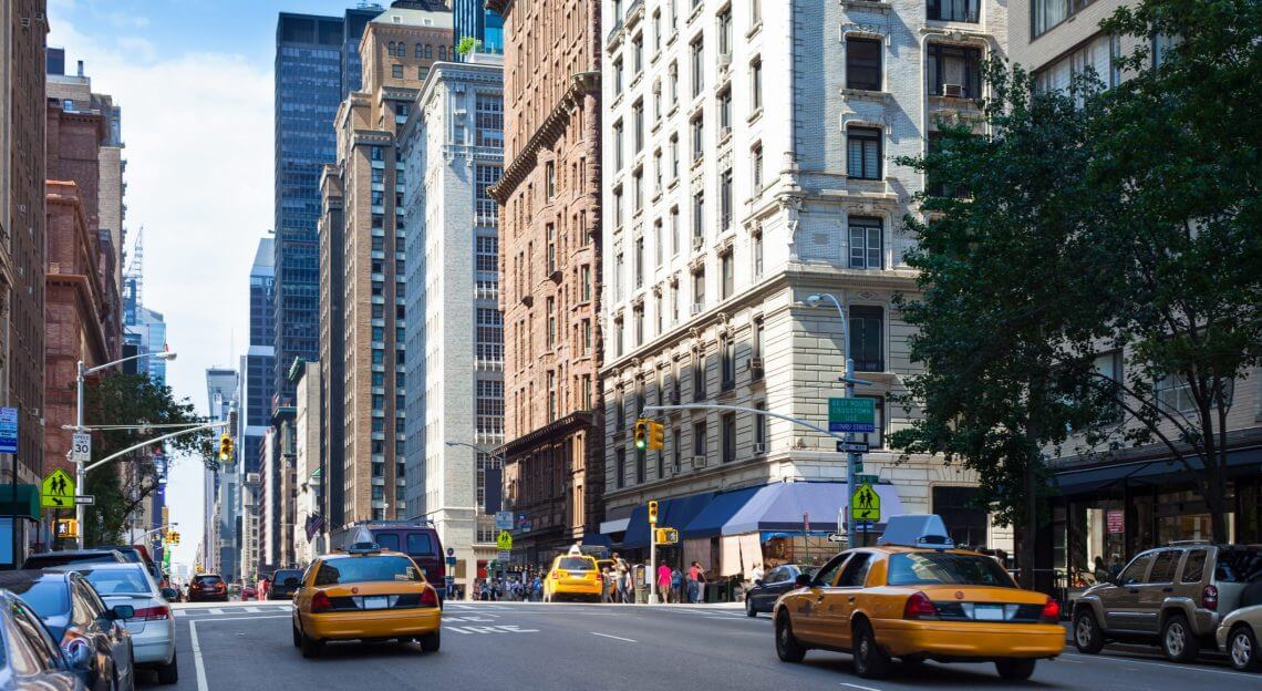 7th Avenue with people and cars in Midtown Manhattan, New York City