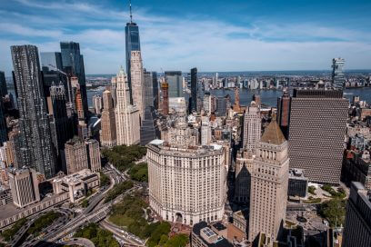 NYC commercial real estate skyline at golden hour.