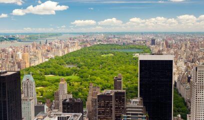 Aerial view of Central Park, a serene contrast to discussions on taxes in NYC office markets.
