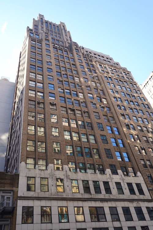 A 23-story office building at 545 Eighth Avenue offering commercial space in Midtown Manhattan.