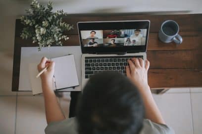 Businesswoman having a video conference in her home office.