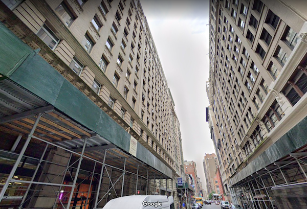 A 12-story office building at 121 West 27th Street, offering Class B office space in Chelsea.