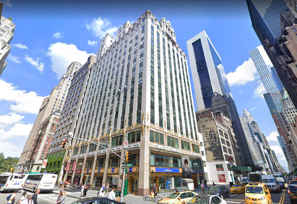 Facade of 57 West 57th Street, a neo-classical office building in Midtown Manhattan.