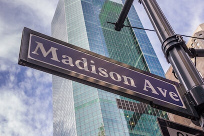 Madison Avenue street sign, emblematic of changing NYC retail landscape.