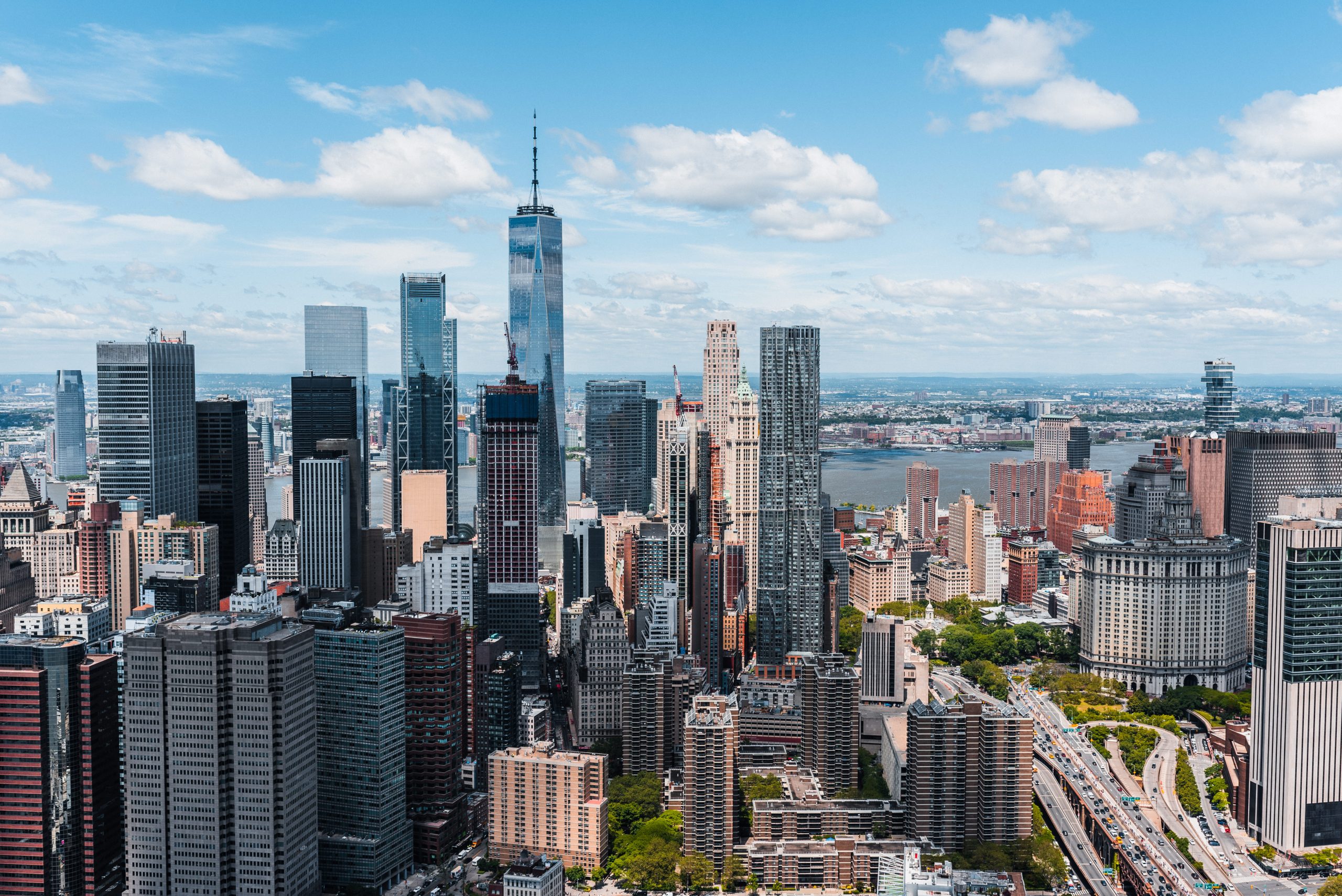 Sunny day in Downtown Manhattan, symbolizing hopes for NYC commercial real estate in 2021.