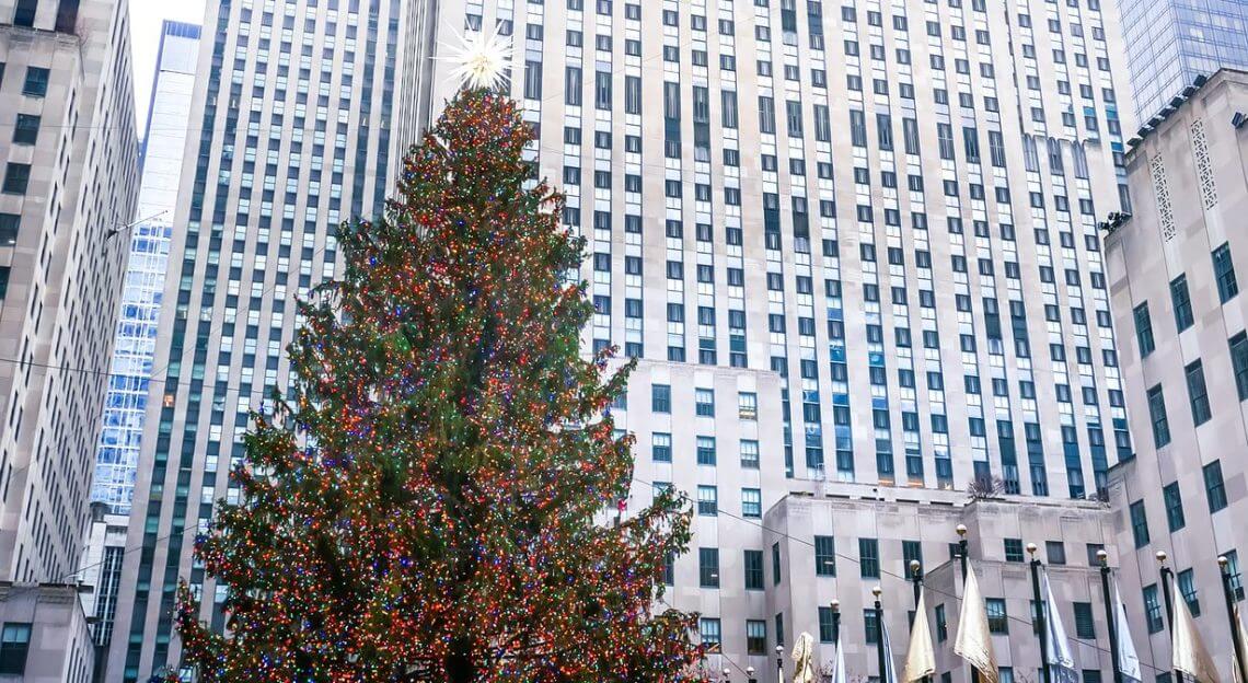 The Rockefeller Christmas Tree, a festive tradition in NYC’s commercial real estate hub.
