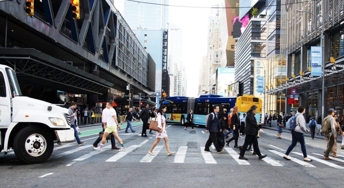 Port Authority Bus Terminal entrance in NYC, emblematic of city infrastructure progress.