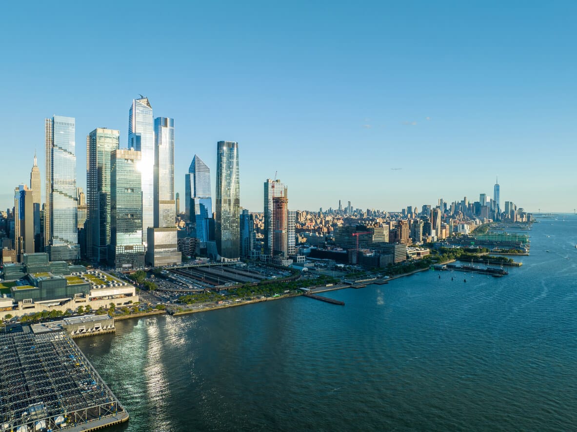 Sweeping sunset view of Hudson Yards and Lower Manhattan, NYC's premium office market.