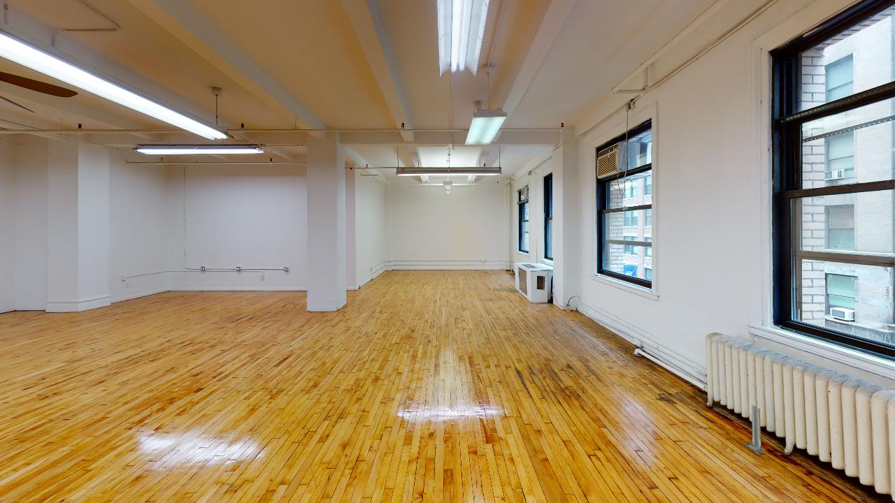 121 West 27th Street Office Space - Panoramic View of the Office with Windows on the Right