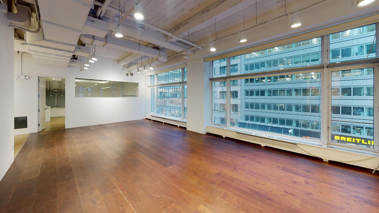 Corner Office Space with Oversized Windows for Lease at 595 Madison Ave, in a Landmark Building.