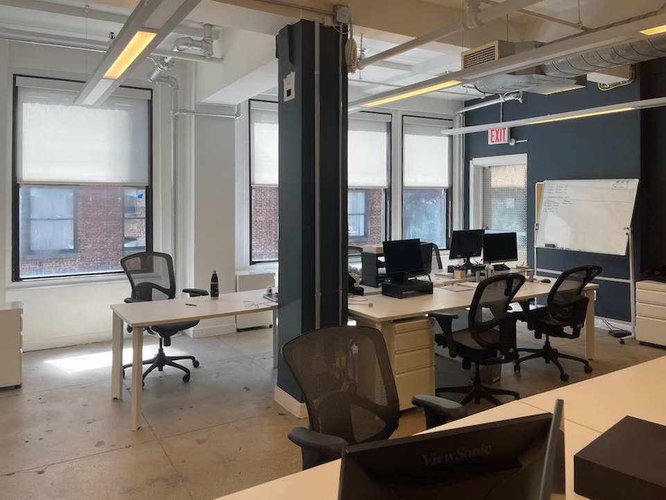 Madison Avenue & 39th Street Office Space - Oversized Windows and Dark Blue Wall