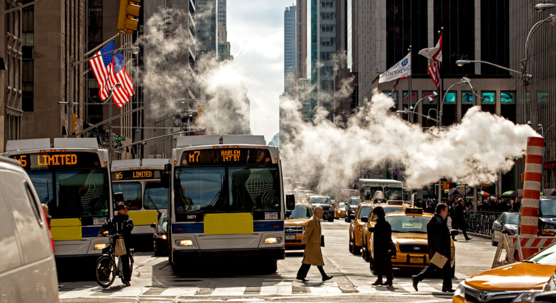 Public buses crowd New York's 8th Avenue, highlighting the need for redevelopment of PABT.