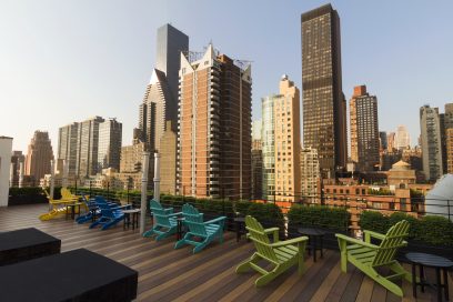 Terrace in Manhattan, morning view of rooftops - ideal commercial real estate with outdoor space.