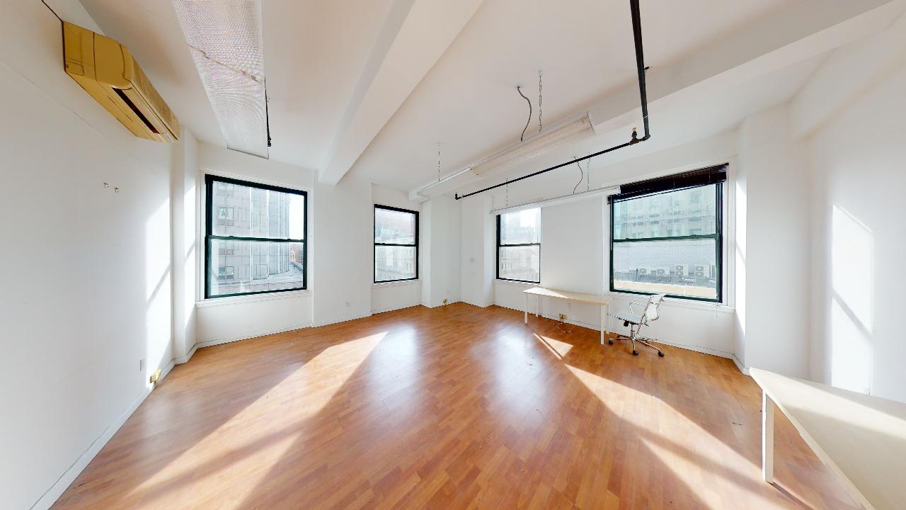 875 SF Corner Loft Office in Move-in Condition for Lease at 291 Broadway, Lower Manhattan.