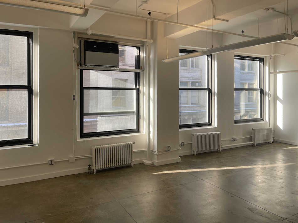 Small open-plan office space for lease at 270 Lafayette Street, offering cheerful ambiance.