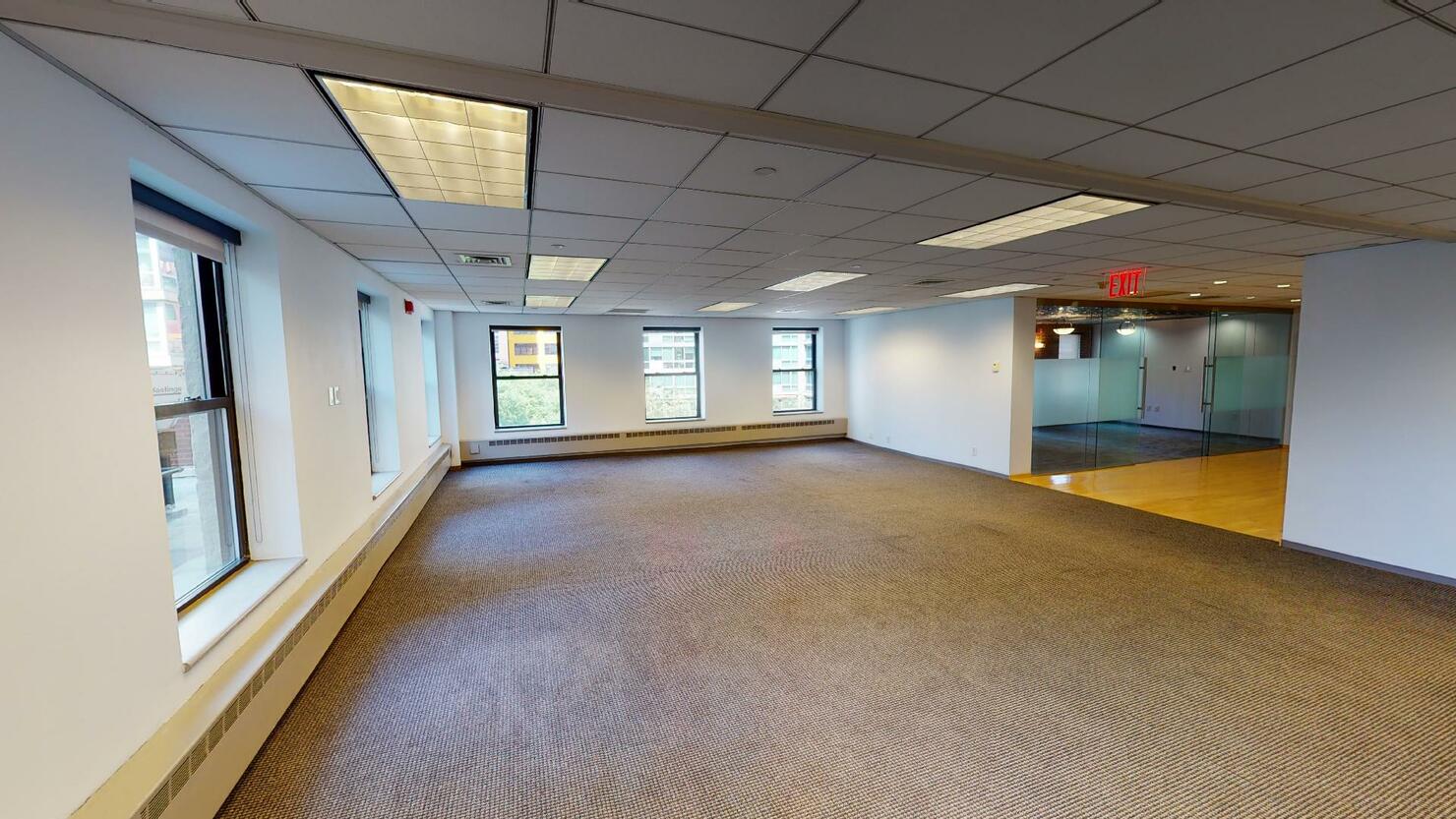 Bright corner office space for lease on 483 10th Avenue near Hudson Yards, New York City.