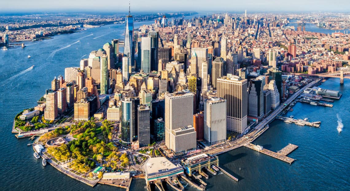 Aerial View of Affordable Lower Manhattan office buildings at Sunset by the Hudson.