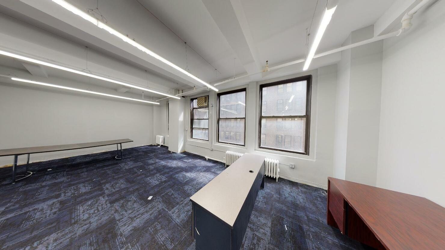 1,800 SF Open-plan Commercial Loft Space for Lease on the 9th Floor of 255 West 36th Street, NYC.