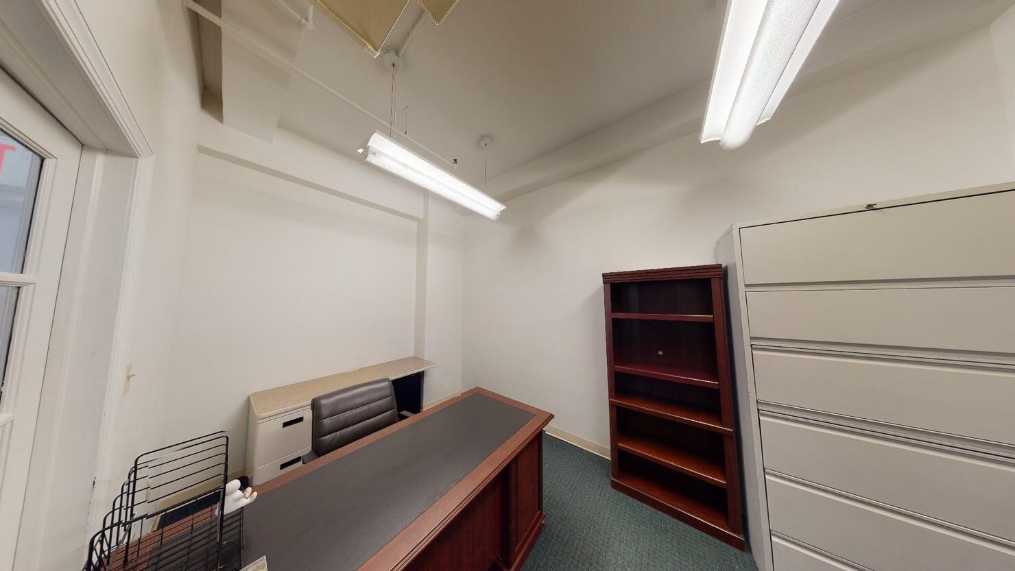 247 West 35th Street Office Space - private office room with a desk and shelves