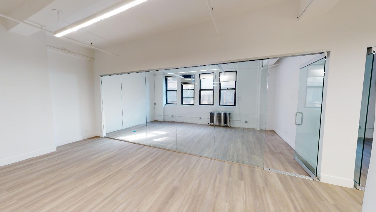 153 West 27th Street Suite #304: Modern office with hardwood floors and stylish amenities
