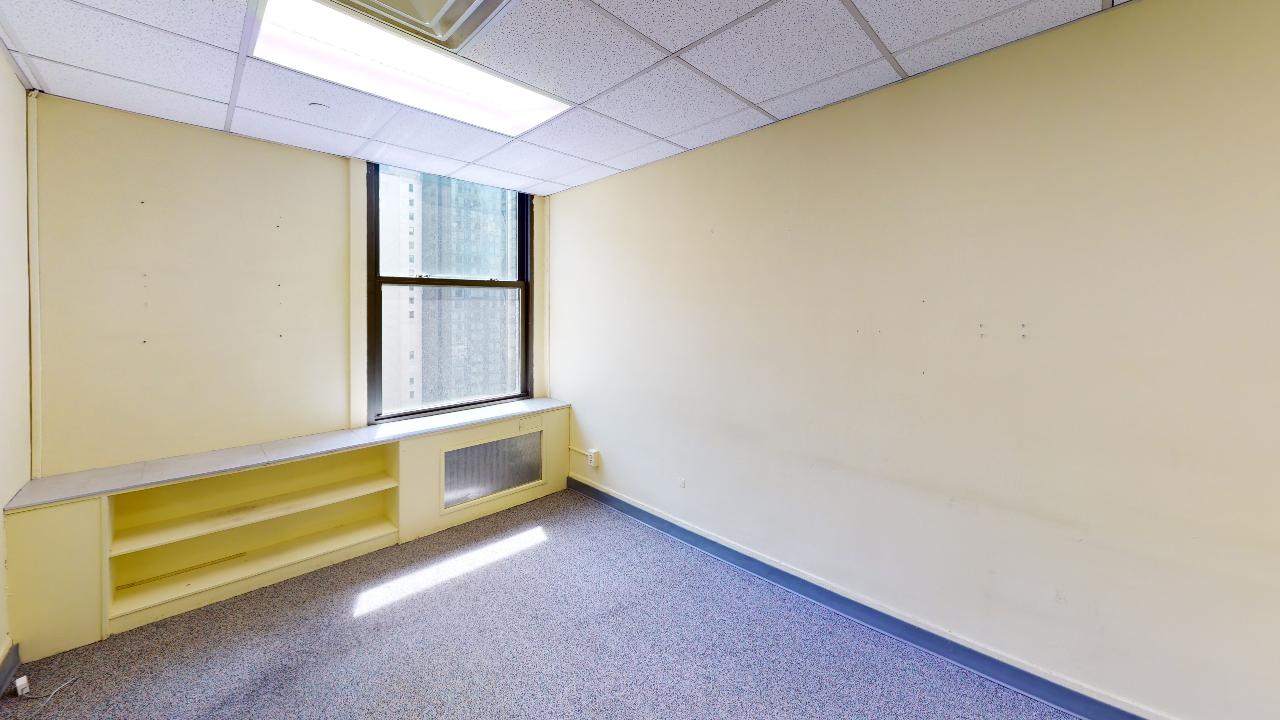 225 Broadway Office Space - Small Office Room with Large Window