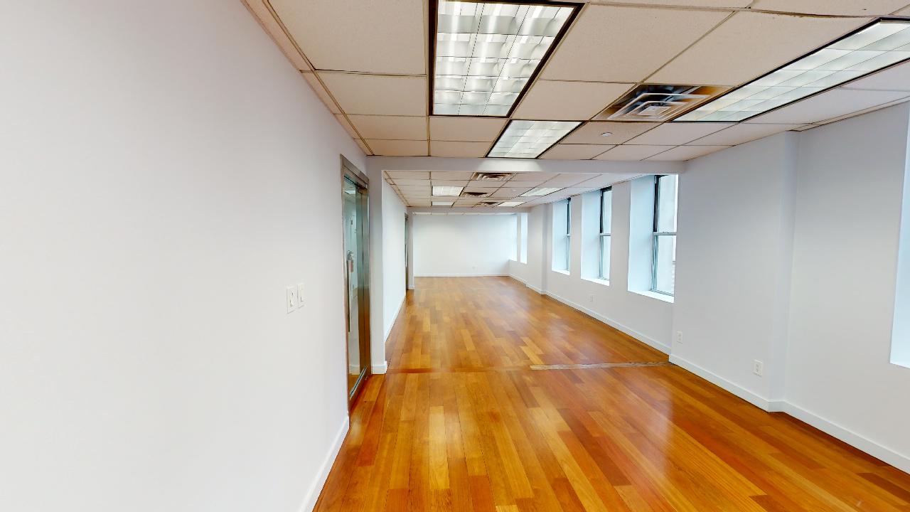 315 Fifth Avenue Office Space - open area with windows on the right
