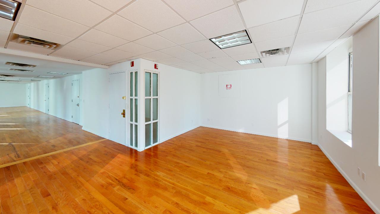 315 Fifth Avenue Office Space - White walls and Hardwood floor