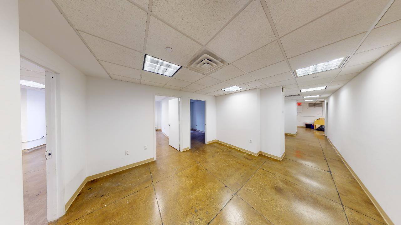 48 West 39th Street 14th Floor: Corner unit with south-facing windows, multiple office spaces