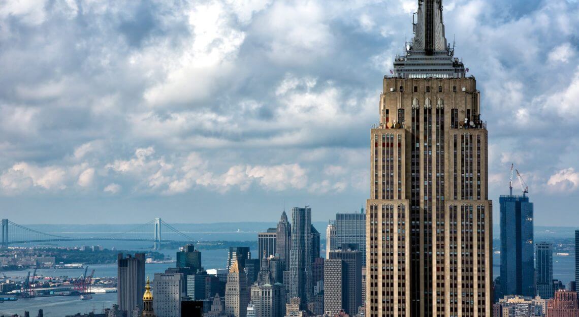 Empire State Building and NYC skyline, emblematic of the quest for small Midtown Class A offices.