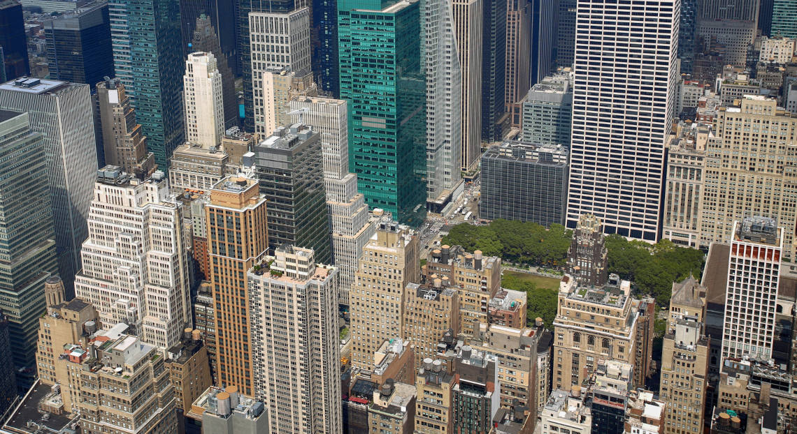 Manhattan Skyscraper Panorama: CWA Local 1182 Leases at 55 West 39th Street.