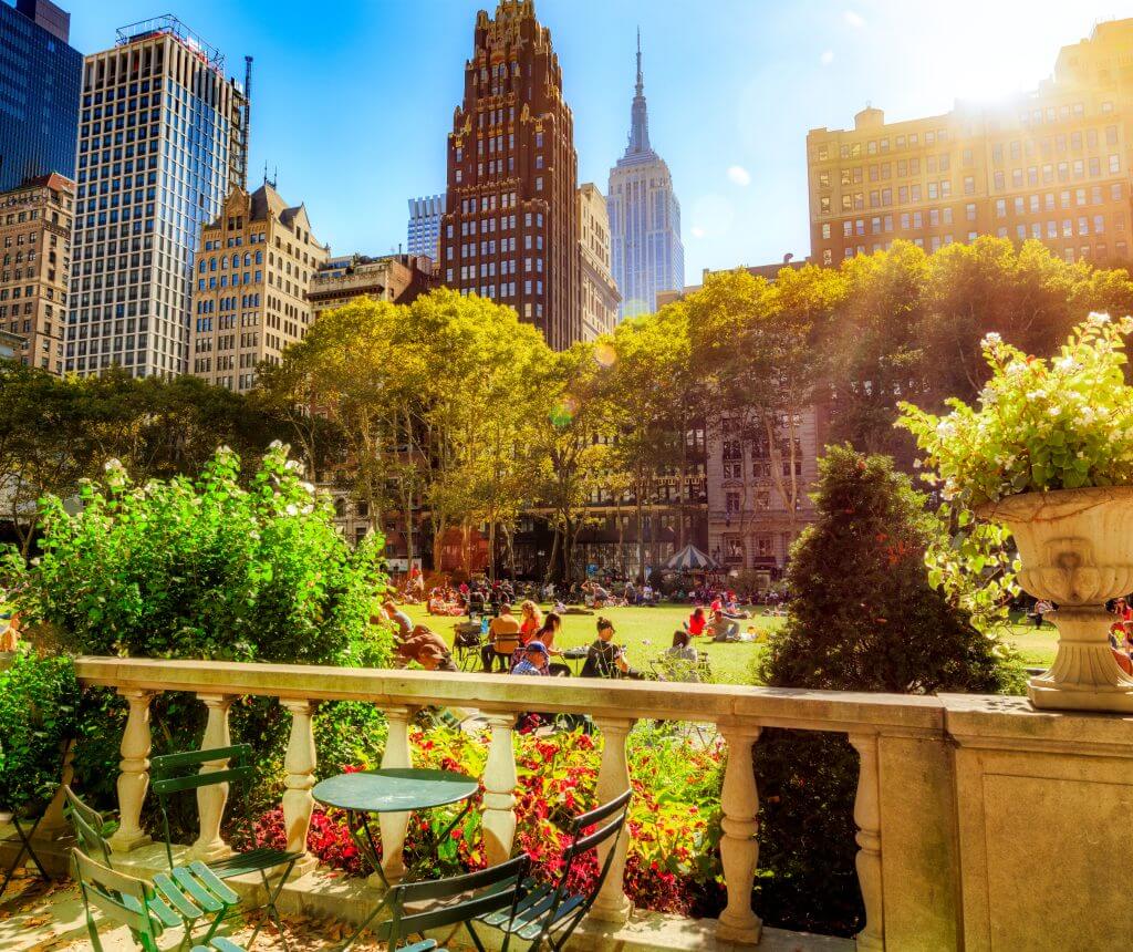 People relaxing in Bryant Park, New York City.