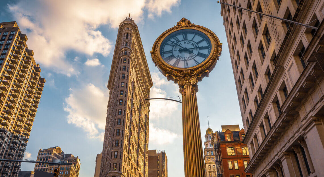 A wide angle view of the Flatiron Building and surrounding buildings in Midtown South, Manhattan.