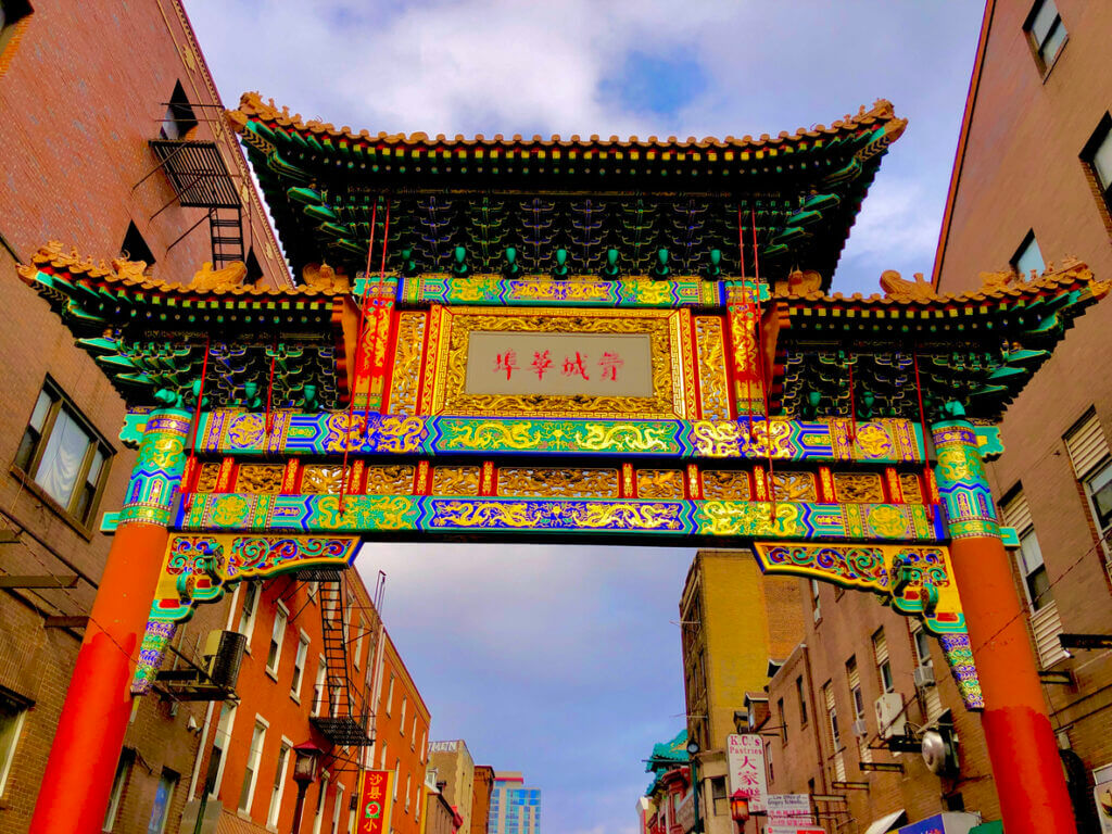 Traditional Chinese gate with dragon carvings in Chinatown, NYC