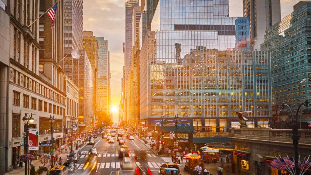 A photo of 42nd Street at sunset, with the Grand Central Terminal on the right.