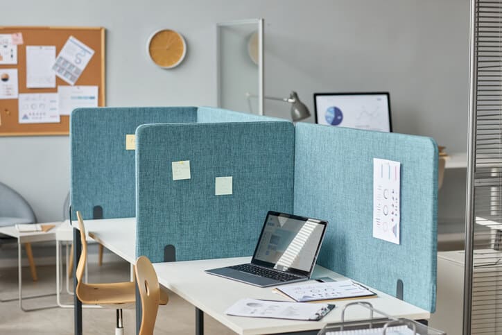 Open office with cubicles and partitioned workspaces