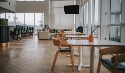 Deserted co-sharing office cafe, emblematic of WeWork's bankruptcy fallout in NYC.