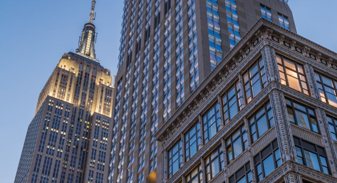 Close-up of buildings on Fifth Avenue, epitomizing luxury in the world's priciest retail market.