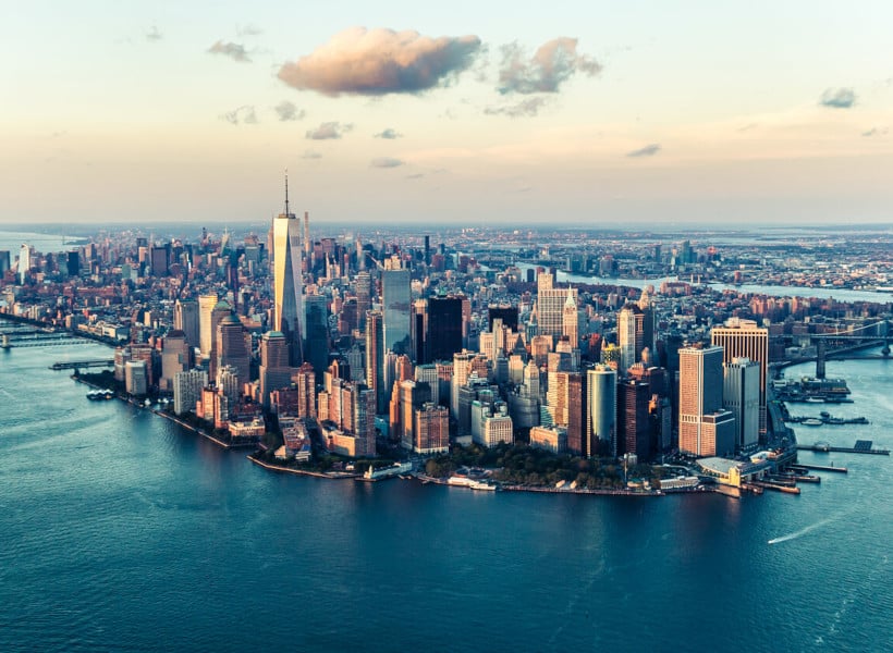 Manhattan Skyline at Sunset, Reflecting NYC's Commercial Real Estate Future.