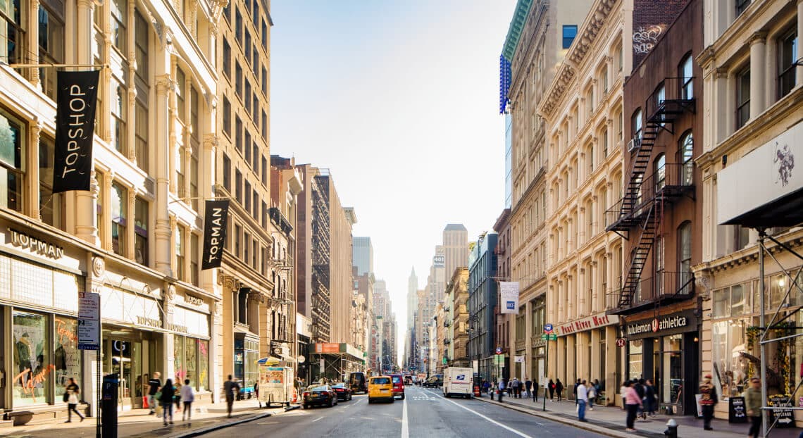 Soho Broadway scene, showcasing Marulli, Mannarino & Erichsen's dynamic move to 299 Broadway.