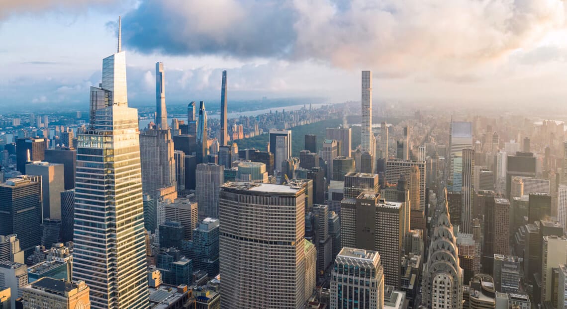 Early Morning Glow Over NYC Skyline, Reflecting Market Dynamics in Commercial Real Estate.