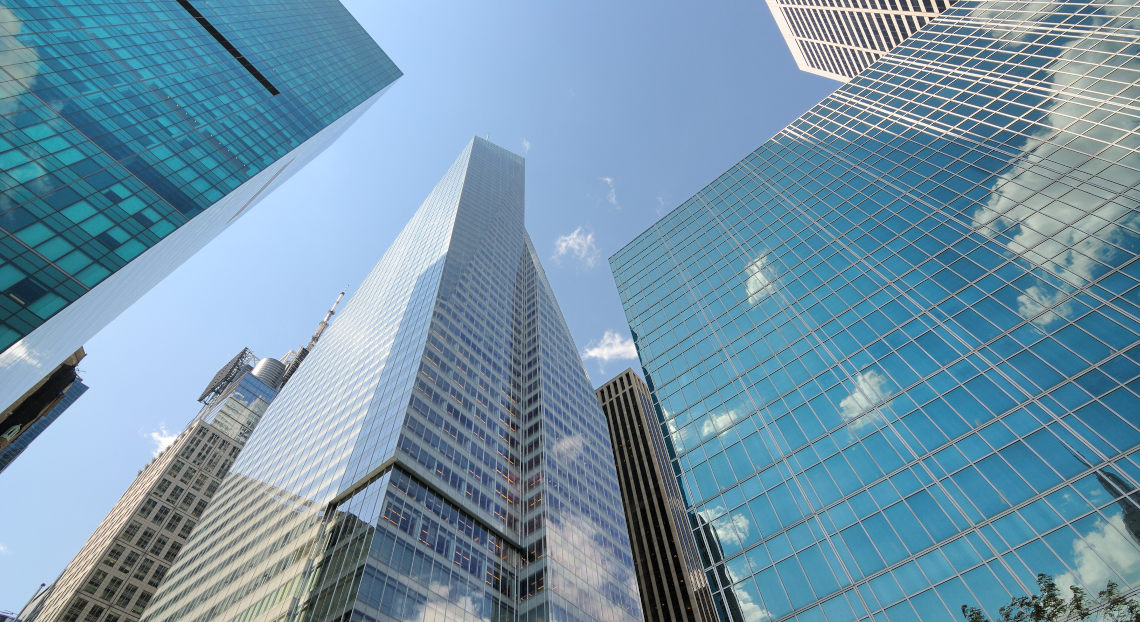 Modern NYC Skyscrapers along intersection of 42nd street and 6th Avenue (Avenue of the Americas).
