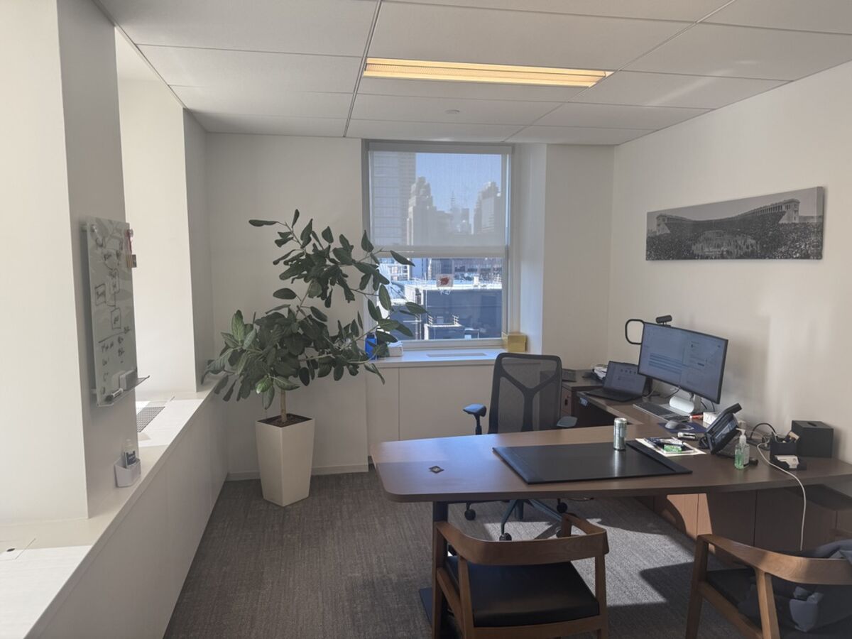 Private windowed office with city views