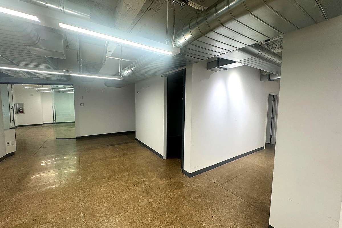 lass front office with exposed ductwork