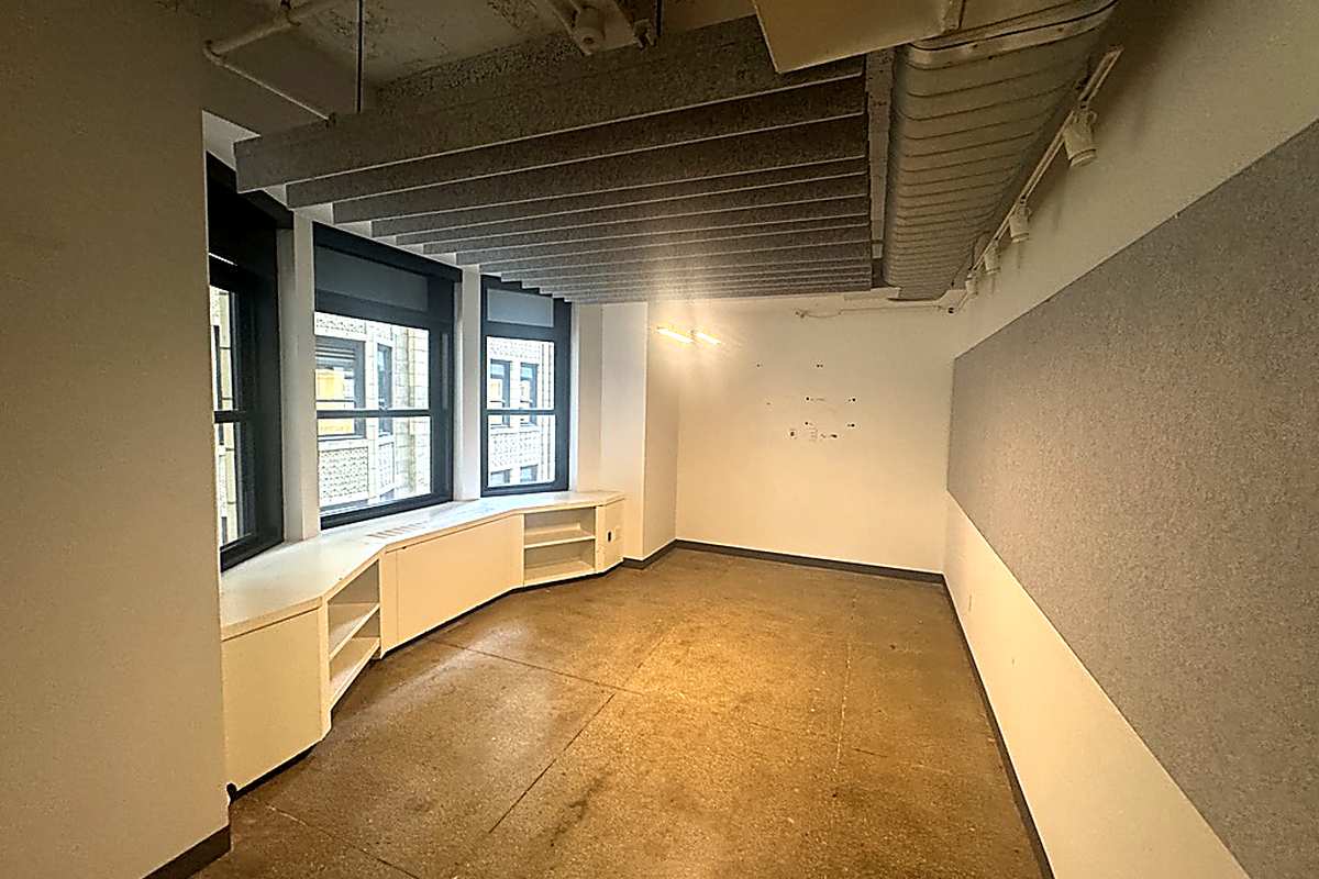 Windowed office with built-in desk