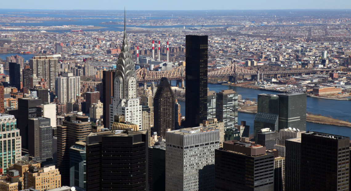 Aerial view of Midtown Manhattan with Chrysler Building and East River.