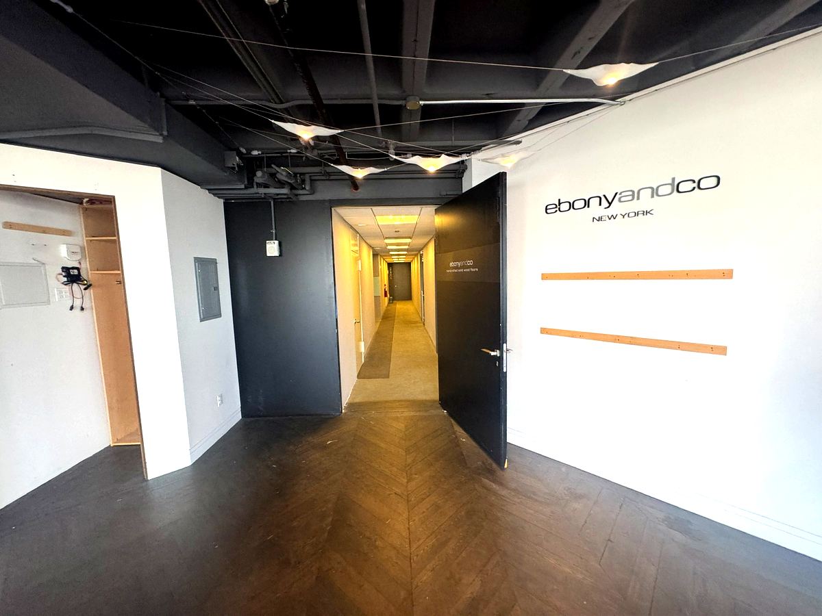 Entry corridor with herringbone hardwood floors, partial 32nd floor at 3 Park Avenue