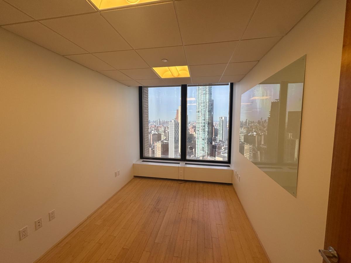 Private office on 37th floor of 3 park avenue with skyline views.