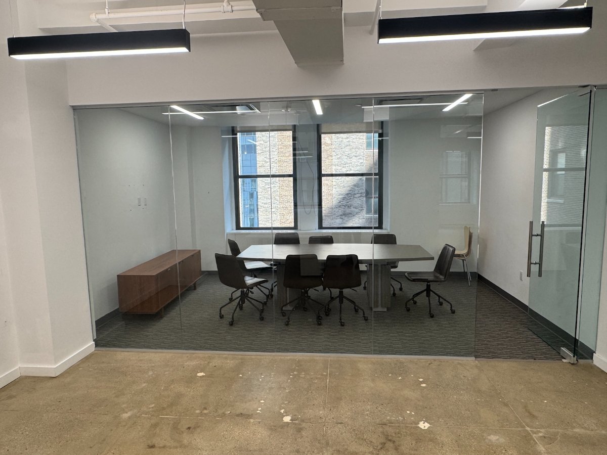 Glass-walled conference room with city views, suite 1002 at 286 Madison Avenue